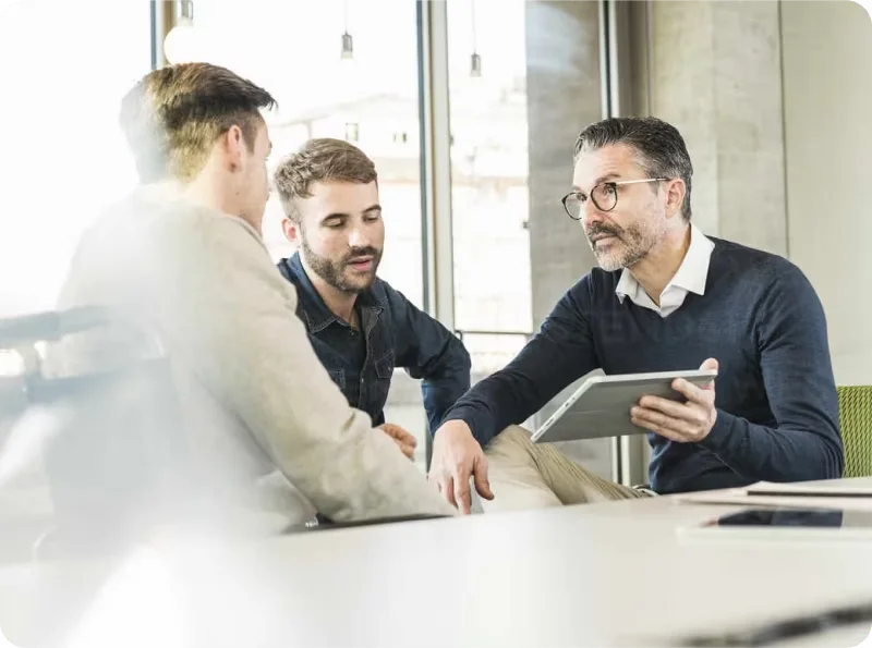 Business professionals collaborating on partnership strategy